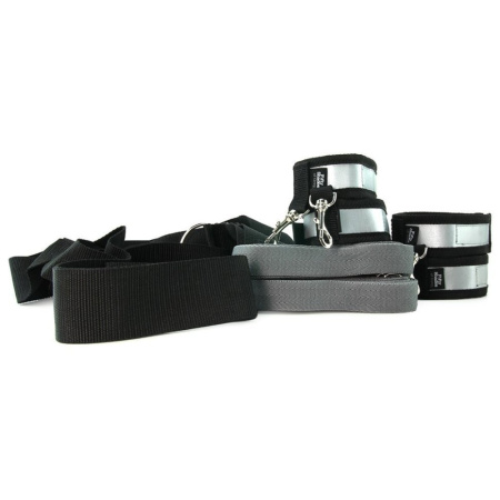 Хрестоподібна ремінна система для фіксації до ліжка 